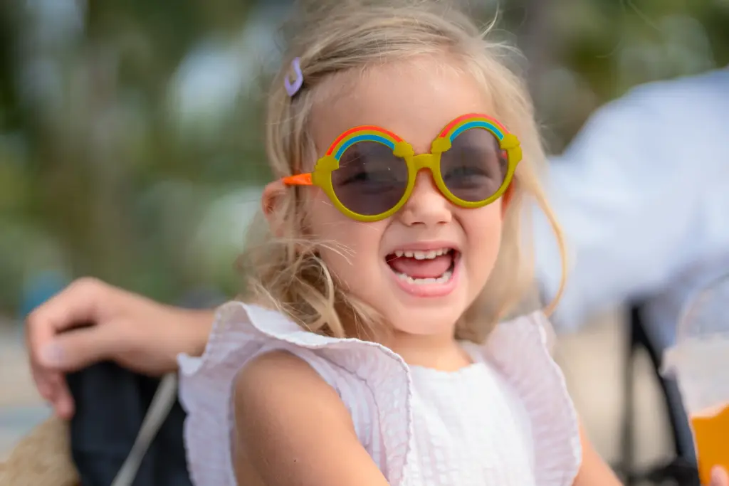 Joyful child with bright smile, highlighting fun and positive dental experience with Laser Dentistry