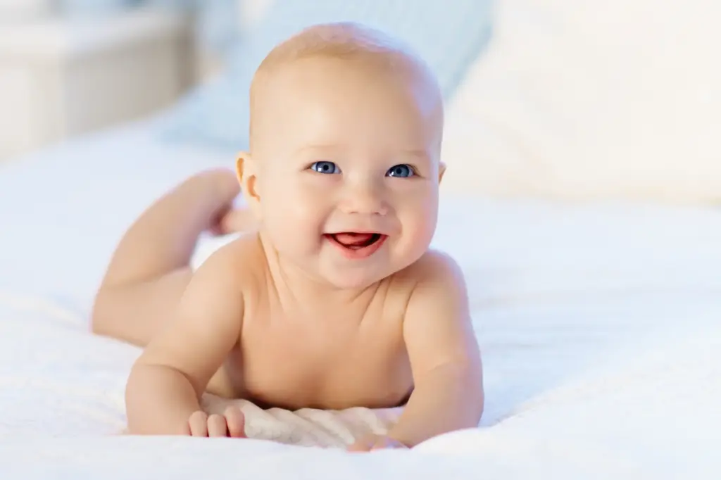 Healthy smiling baby, highlighting importance of infant dental care